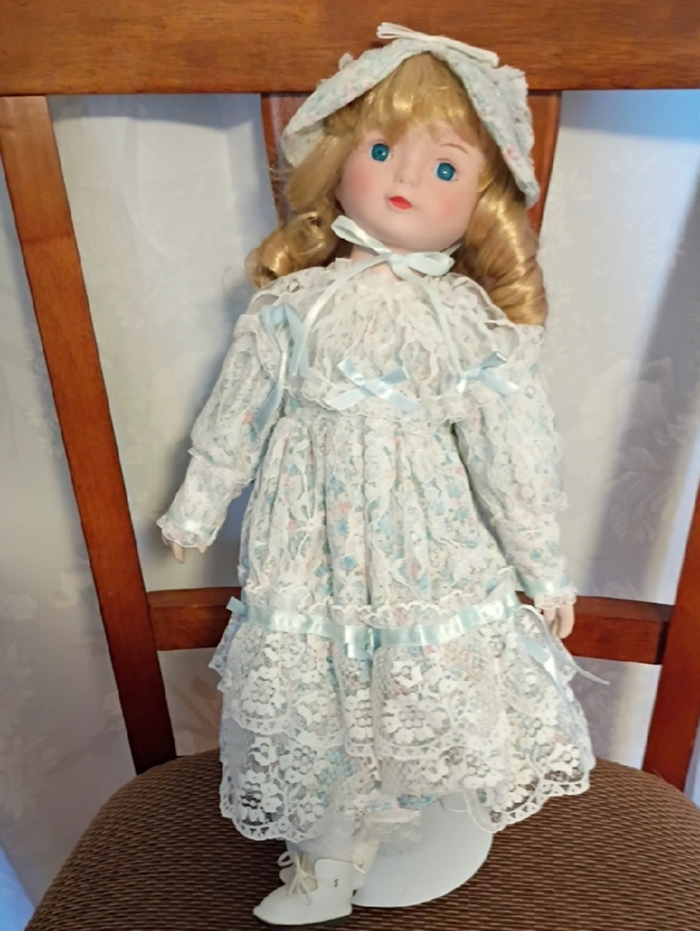 Classic Blue-Eyed Blonde Doll in White Lace Dress with Blue Trim